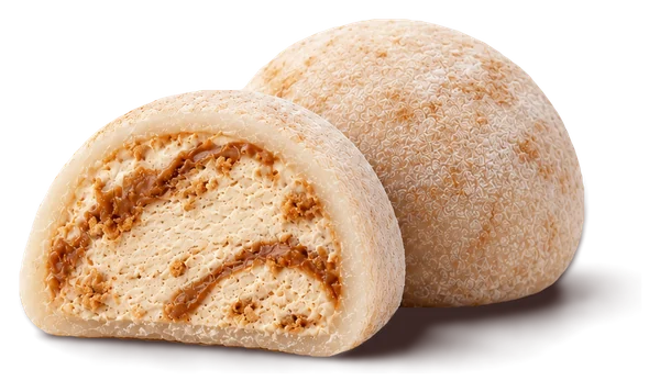 Biscoff mochi cut open, showing cheesecake cream swirled with caramel Biscoff