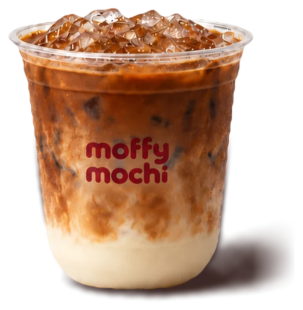 Iced Hokkaido Japanese coffee, coffee swirling into creamy Hokkaido milk over ice
