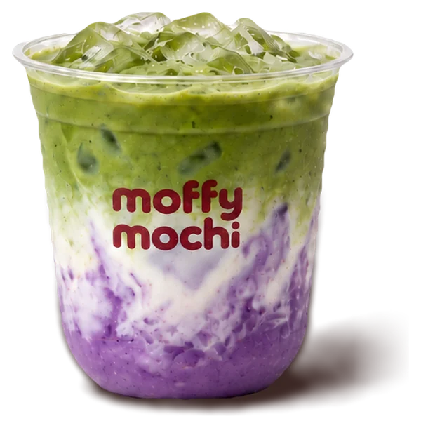Ube matcha latte with purple ube over green matcha and milk